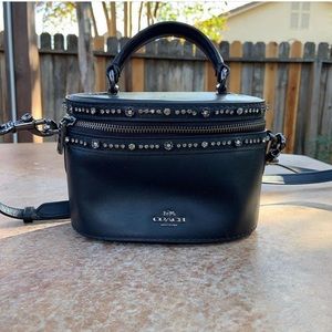 Coach black purse Selena Gomez